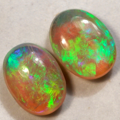 SOLID CRYSTAL OPALS Matching pair, 3D pattern. Bright green fire sparkles